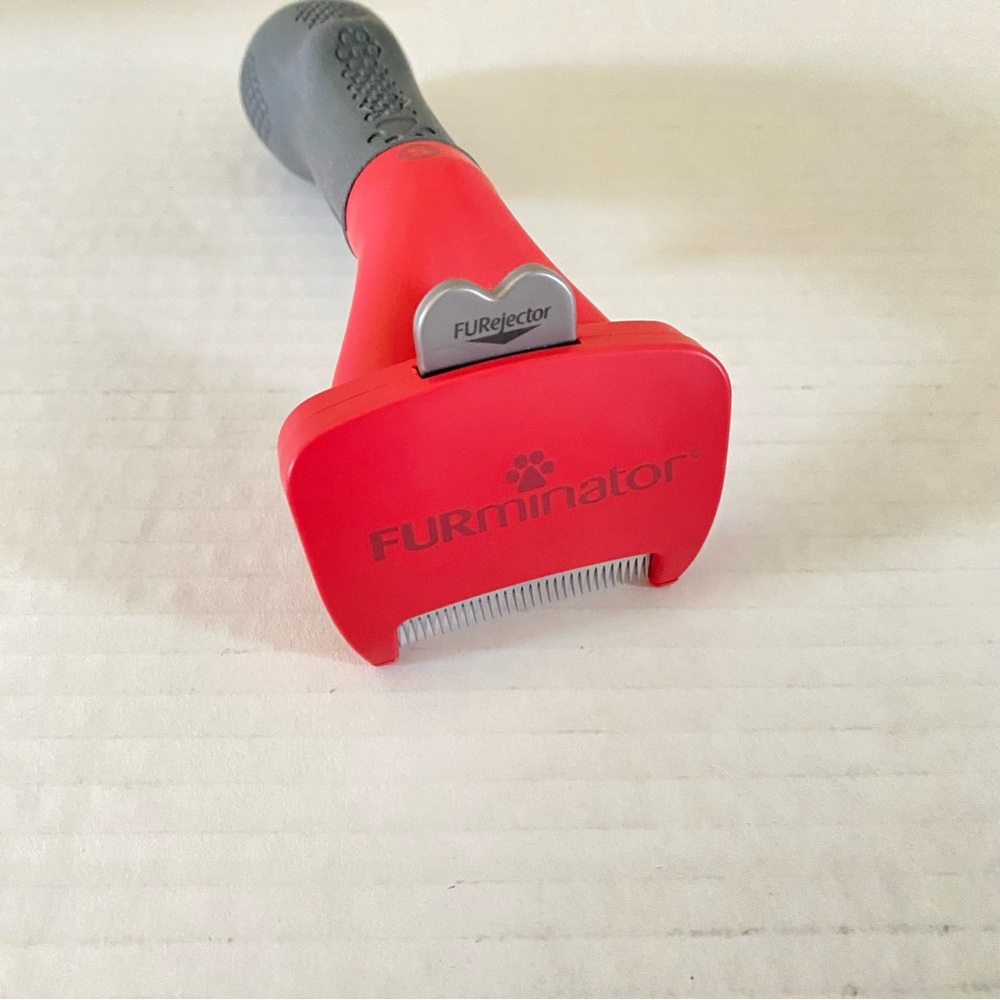 FURminator Pet Deshedding Tool in Red and Gray